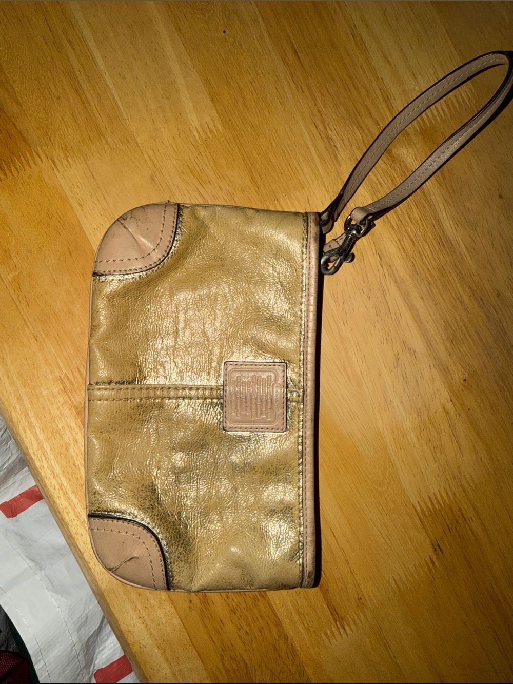 Coach Gold Leather Wristlet with Tan Trim